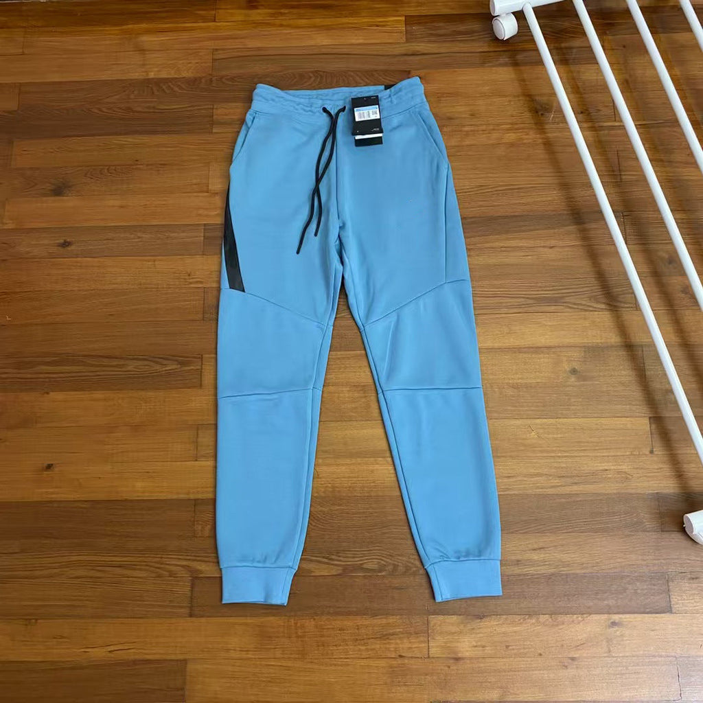 Men wearing GMabcd 2025 casual sports hooded slim fit suit jackets with side zippers outdoors
